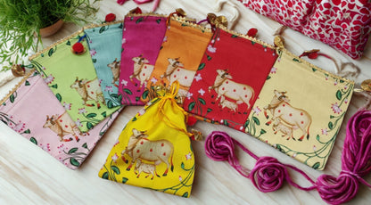 Ethnic Drawstring Potli Pouch 7×9 Inch with Cow Motif | Handmade Fabric Return Gift Bag